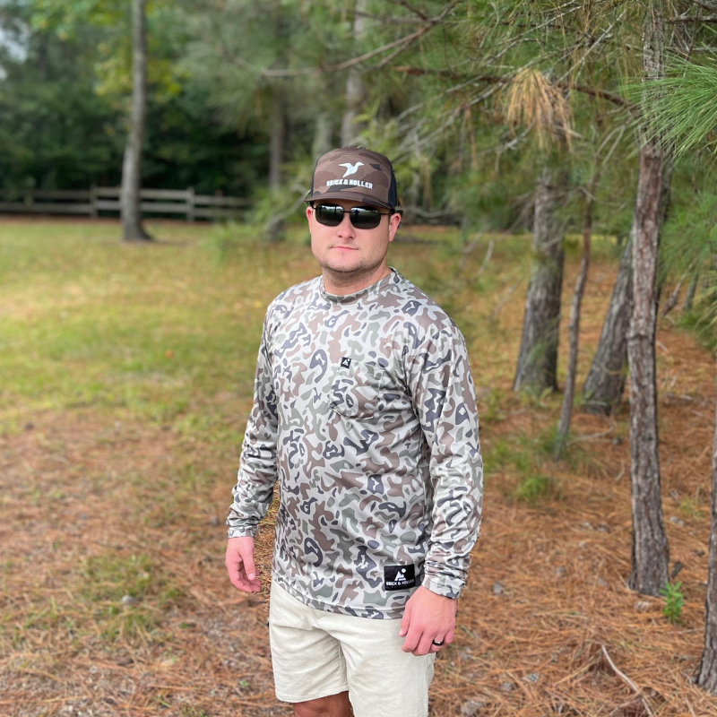 Brick & Holler Outdoors Duck Camo Hat. A fantastic style Duck Camouflage Cambridge PB260 trucker-style hat. Finest in comfort and style. Take this camo hat hunting and look good in the woods.